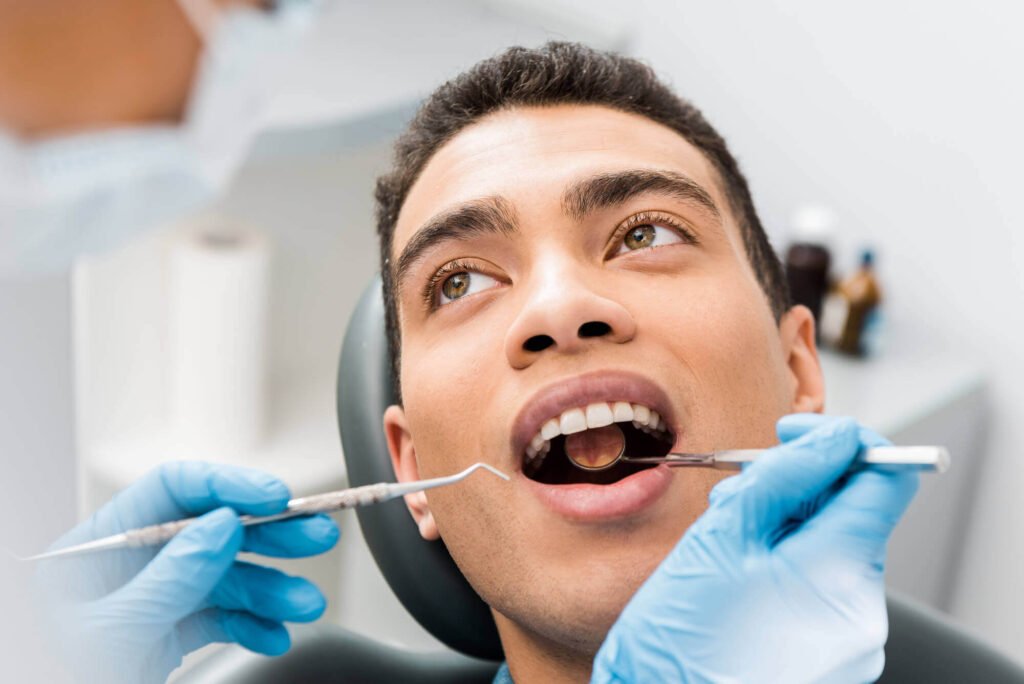 a male patient gets Dental Implants in Cameron Park