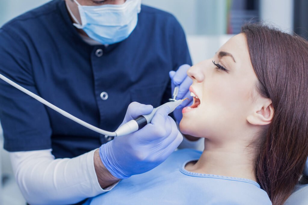 a Shingle Springs Dentist working on a patient's teeth