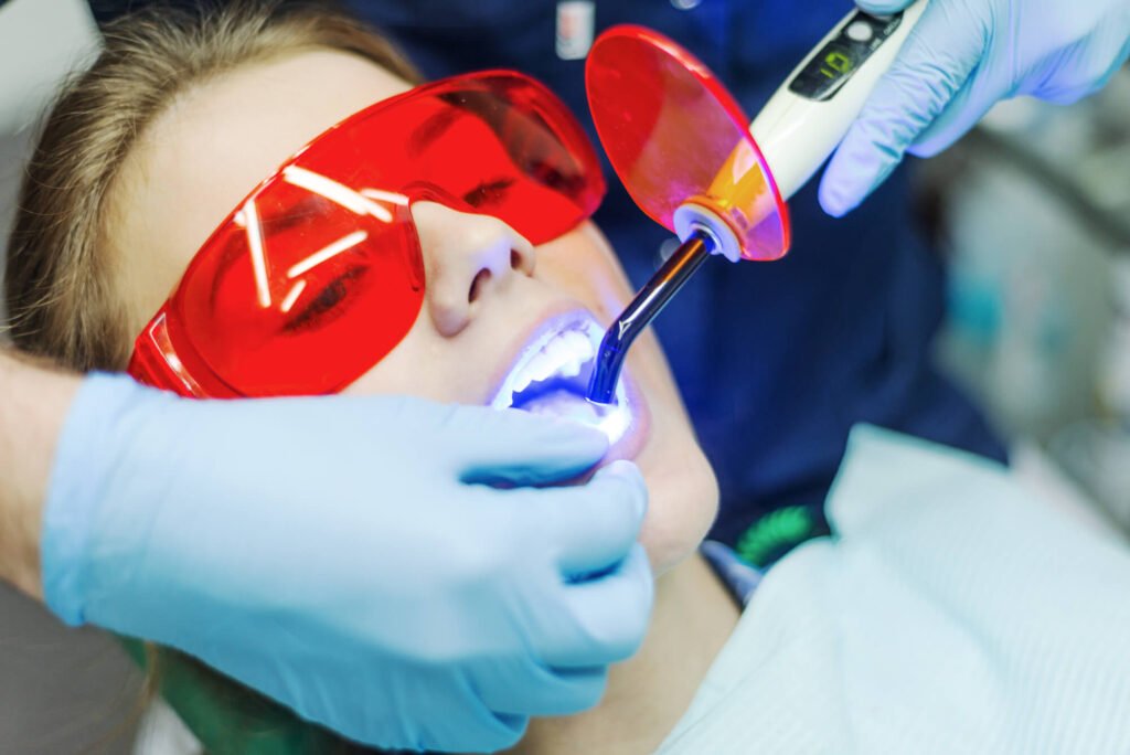 Girl during Teeth Whitening procedure in Cameron Park