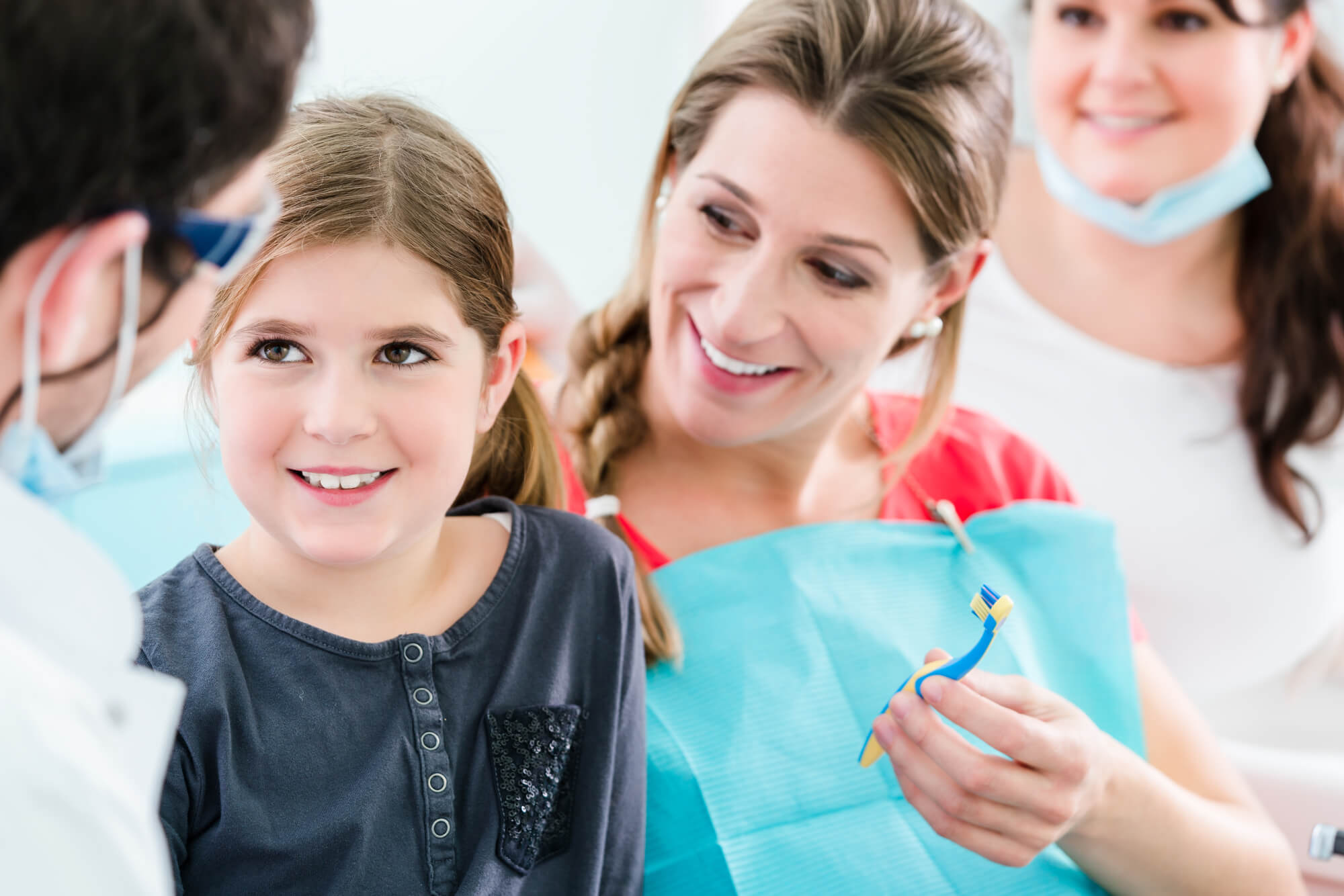 a little girl smiling at a Family Dentist in Cameron Park
