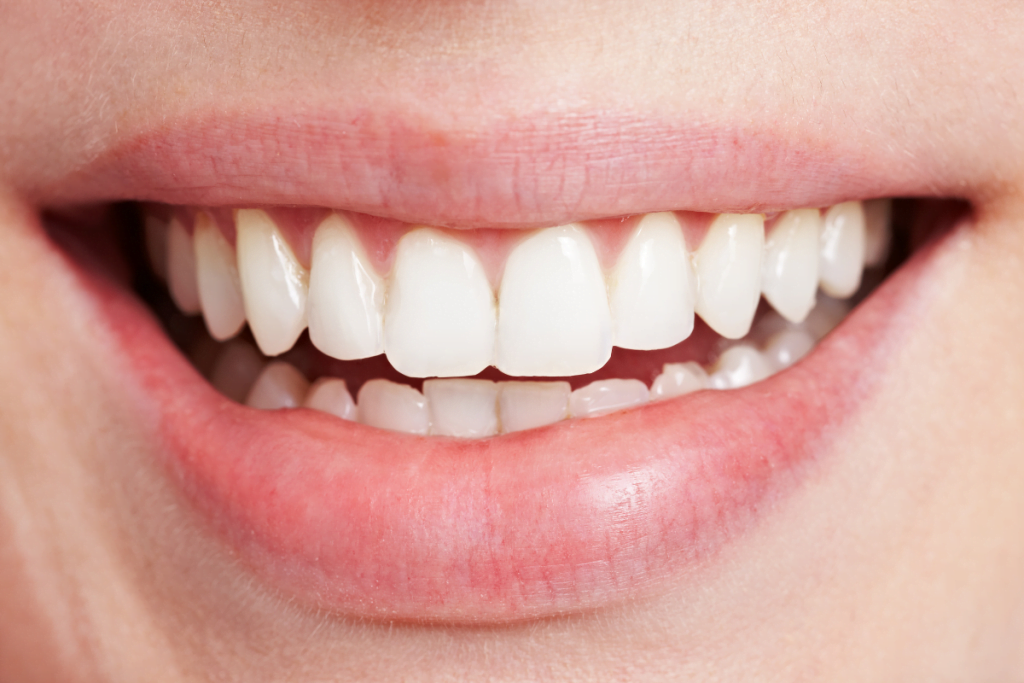 close up of a person's mouth and teeth