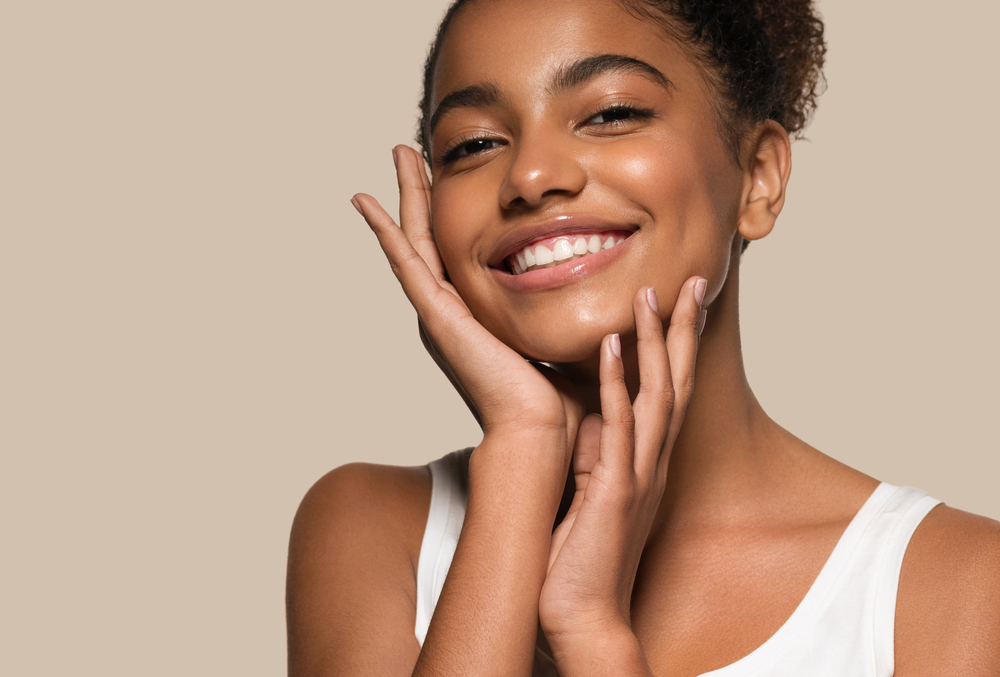 A woman's radiant smile, a testament to the comfortable and Anxiety-Free Solutions at Forest Ridge Dental Health & Wellness
